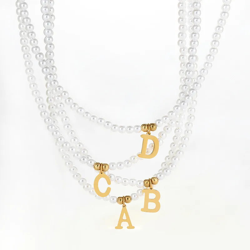 "A Lil Sum" Initial Mark necklace