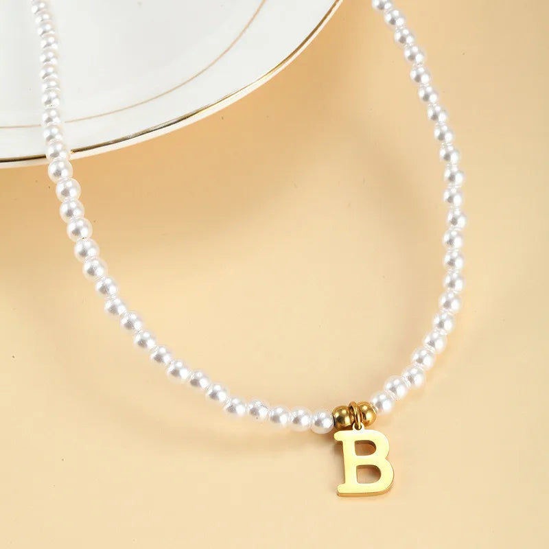 "A Lil Sum" Initial Mark necklace